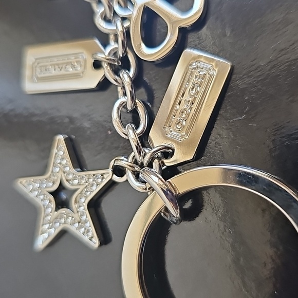 Coach NWOT Silver Keychain with Heart, Star, and Butterfly Charms - Picture 5 of 7